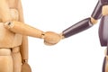 Wooden dummies shaking hands Royalty Free Stock Photo