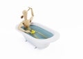 Wooden Dummy in a Bath isolated on White