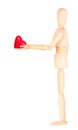 Wooden Dummy holding red heart Royalty Free Stock Photo