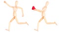 Wooden Dummy holding red heart Royalty Free Stock Photo