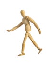 Wooden dummy mannequin figurine walking Royalty Free Stock Photo
