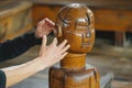 wooden dummy for martial arts, person practicing punches