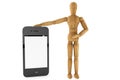 Wooden dummy with mobile smartphone Royalty Free Stock Photo