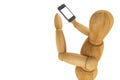 Wooden dummy with mobile smartphone Royalty Free Stock Photo