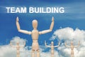 Wooden dummy puppet on sky background with word TEAMBUILDING Royalty Free Stock Photo