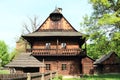 Wooden dwell with timbered city house