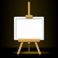 Wooden easel with blank canvas on a dark back