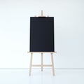 Wooden easel with empty black canvas. 3d rendering
