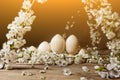 Wooden easter eggs among flowering cherry branches on a rustic table. symbolic composition of the spring holiday for a gift card.