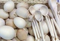 Wooden Easter eggs and wooden spoons for self-coloring with paints for the Easter holiday