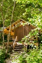 Wooden eco-friendly house in the forest Royalty Free Stock Photo