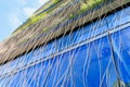 Wooden eco texture on the facade of a modern building. Background with selective focus Royalty Free Stock Photo