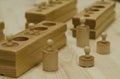 Wooden educational toy. cylinders of different sizes. Montessori development. constructor. education of children. toy made of wood