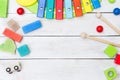 Wooden educational toys on a wooden background Royalty Free Stock Photo