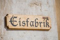 Wooden Eisfabrik or ice factory sign at ghost town Kolmanskop near Luderitz, Namibia, Southern Africa