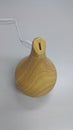 Wooden electric humidifier on a white ba