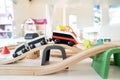 A wooden electric train and railway toy set for children in a daycare place and indoor playground Royalty Free Stock Photo