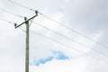 Wooden electricity pole in a cloudy day Royalty Free Stock Photo