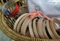Wooden embroidery hoops and needle work accessories in basket