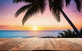wooden empty table, sunset, palm trees, beach, ocean Royalty Free Stock Photo