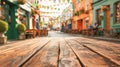 Wooden empty tabletop on blurred city street background with green holiday garlands and St. Patrick's Day flags Royalty Free Stock Photo