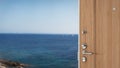 Wooden entrance door opening on amazing landscape, dreamy seascape , blue ocean, travel concept idea