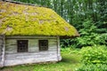 Wooden ethnic house with thatched roof. Halych Ethnography museum, Ukraine Royalty Free Stock Photo