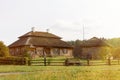 Wooden ethnic houses on rural landscape - village of birthplace of Tadeusz Kosciuszko - Kossovo, Belarus Royalty Free Stock Photo