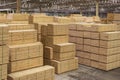 Wooden factory piles pallets storage inside shed