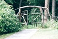 Wooden fairy gate in the forest. Opening secret wooden door Royalty Free Stock Photo