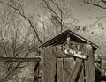 Falling Down Outhouse in the Old West with Out of Order Sign