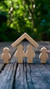 Wooden family peg symbolizes insurance coverage, ensuring travel security