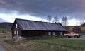 Wooden farm house in Oppdal valley in Trondelag in Norway on autumn evening