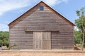 A wooden farm shed/ wooden barn and blue sky Royalty Free Stock Photo