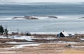 Wooden farmhouse  facing the atlantic oceanat Grindavik village in   spring Iceland Royalty Free Stock Photo