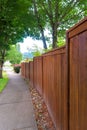 Wooden Fence along residential Neighborhood Sidewalk