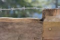 wooden fence barbed wire concept restricted area Royalty Free Stock Photo