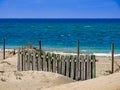 Wooden fence on the beach of Chipiona Cadiz Andalusia Royalty Free Stock Photo