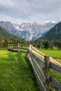 Wooden fence with bench in Zgornje Jezersko, Kamnik-Savinja Alps Royalty Free Stock Photo