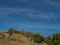 Wooden fence in the country under a blue sky Royalty Free Stock Photo