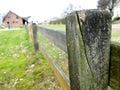 Wooden fence in a countryside. Close-up