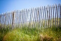 Wooden fence, Green Grass and Blue Sky Royalty Free Stock Photo