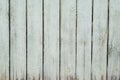 Wooden fence with green old paint, vertical boards, texture background exterior Royalty Free Stock Photo