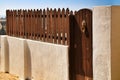 Wooden fence and knocker lion shaped Royalty Free Stock Photo