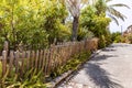 Wooden fence made in the old style on one of the quiet streets near the main pedestrian HaMeyasdim in Zikhron Yaakov city in Royalty Free Stock Photo