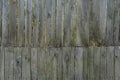 wooden fence made of unpainted boards, close-up shot Royalty Free Stock Photo