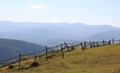 Wooden fence in mountains Royalty Free Stock Photo