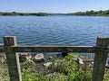 Wooden fence overlooking a lake Royalty Free Stock Photo