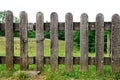 Wooden fence with a padlock and chain in a field near Lyon, France Royalty Free Stock Photo