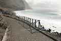 Wooden fence of a pathway in the Atlantic Ocean coast Madeira, Portugal Royalty Free Stock Photo